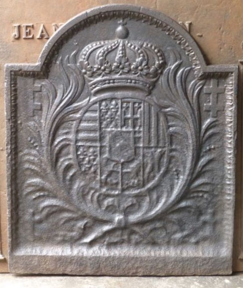 Plaque de cheminée en fonte datée de 1690